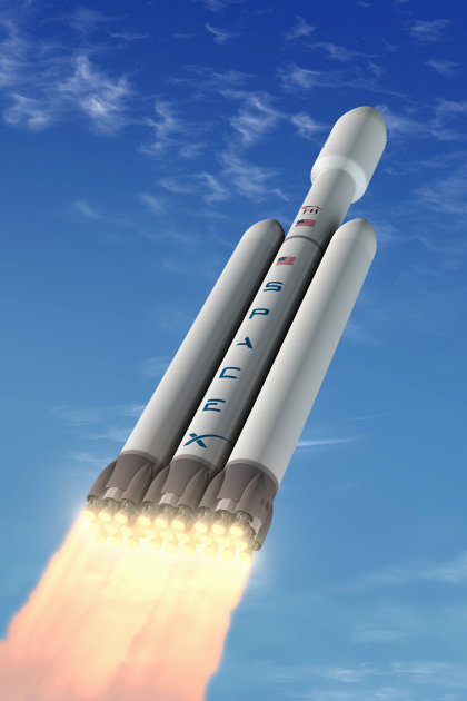 This undated artist rendering provided by Space Exploration Technologies (SpaceX), shows Space Exploration Technology's new rocket Falcon Heavy. On Tuesday, Elon Musk, CEO and chief rocket designer of