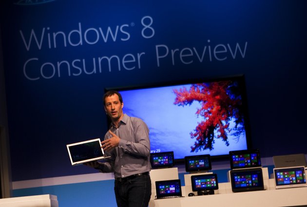 Corporate Vice President of Windows Web Services, Antoine Leblond attends the Windows 8 Consumer Preview presentation during a press conference at the Mobile World Congress in Barcelona, Spain, Wednesday, Feb. 29, 2012. A test, or beta, version of the revamped operating system has been unveiled Wednesday in Barcelona, nudging it a step closer to its anticipated release next fall. (AP Photo/Emilio Morenatti)