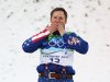 Jeret Peterson of the US celebrates winning the silver medal in the Freestyle skiing aerials at the 2010 Winter Olympics