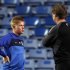 KRC Genk's coach Mario Been talks to Kevin De Bruyne during a team training session at Stamford Bridge in London