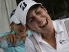 Jennifer Johnson gets doused by fellow player Lexi Thompson after she won the Mobile Bay LPGA Classic golf tournament at the Robert Trent Jones Golf Trail at Magnolia Grove in Mobile, Ala. Sunday, May 19, 2013. (AP Photo/Dave Martin)