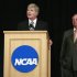 NCAA President Emmert speaks near Executive Committee Chairman Ray at NCAA headquarters in Indianapolis