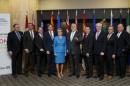 Premiers and officials of Canadian provinces and territories pose for a family photo at the Quebec Summit On Climate Changes at the Hilton hotel in Quebec City