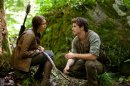 In this image released by Lionsgate, Jennifer Lawrence portrays Katniss Everdeen, left, and Liam Hemsworth portrays Gale Hawthorne in a scene from 
