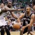 San Antonio Spurs point guard Tony Parker (9) of France passes off the ball as Utah Jazz center Al Jefferson (25) pressures during the first half of Game 4 in the first-round NBA basketball playoff series, Monday, May 7, 2012, in Salt Lake City. (AP Photo/Colin E Braley)