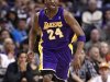 Los Angeles Lakers' Kobe Bryant brings the ball up during the first half of an NBA basketball game against the Phoenix Suns, Sunday, Feb. 19, 2012, in Phoenix. (AP Photo/Matt York)