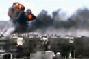 This video image taken from amateur video and broadcast by Bambuser/Homslive shows a series of devastating explosions rocking the central Syrian city of Homs, Syria, Monday, June 11, 2012. Live streaming video caught the devastation during one of the heaviest examples of violence since the uprisings began over a year ago. (Photo/Bambuser/Homslive via AP video) MANDATORY CREDIT: BAMBUSER/HOMSLIVE