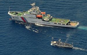 A China Coast Guard ship (top) and a Philippine supply&nbsp;&hellip;