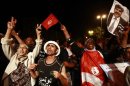 Protesters demonstrate to call for the departure of the Islamist-led ruling coalition in Tunis