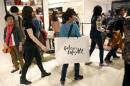 File photo shows customers visit the Galeries Lafayette department store in Paris