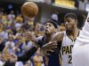 New York Knicks' Carmelo Anthony, left, and Indiana Pacers' Paul George vie for a rebound during the first half of Game 4 of an Eastern Conference semifinal NBA basketball playoff series, on Tuesday, May 14, 2013, in Indianapolis. (AP Photo/Darron Cummings)