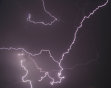 A bolt of lightning strikes in the horizon over Jammu, India during a summer storm on Monday, May 9, 2011. (AP Photo/ Channi Anand)