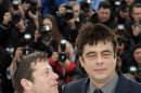 Actors Mathieu Amalric, left, and Benicio Del Toro pose for photographers during a photo call for the film Jimmy P. Psychotheraphy of a Plains Indian at the 66th international film festival, in Cannes, southern France, Saturday, May 18, 2013. (AP Photo/Francois Mori)