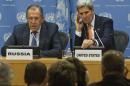 Russian Foreign Minister Sergey Lavrov, left, and U.S. Secretary of State John Kerry hold a press conference after a meeting in the U.N. Security Council of foreign ministers for a vote concerning Syria, Friday, Dec. 18, 2015, at U.N. headquarters. (AP Photo/Bebeto Matthews)