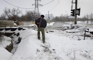 A seperatist rebel fighter walks towards a check-point &hellip;