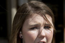 Katy Butler, 17, a high school student, from Ann Arbor, Mich., speaks to media on Wednesday March 7, 2012, in Los Angeles. Butler delivered petitions of more than 200,000 signatures to the Motion Picture Association of America urging them to change the 
