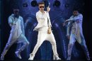 FILE - In this March 28, 2013 file picture Canadian singer Justin Bieber performs on stage during the "I Believe Tour " in Munich, southern Germany. A German official says Justin Bieber had to leave a monkey in quarantine after arriving in the country last week without the necessary papers for the animal. The 19-year-old singer arrived at Munich airport last Thursday. Customs spokesman Thomas Meister said Saturday March 30, 2013 that when he went through customs he didn't have the documentation necessary to bring the capuchin monkey into the country - so the animal had to stay with authorities. (AP Photo/Matthias Schrader,File)
