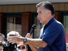 Raw Video: Romney in shouting match with crowd
