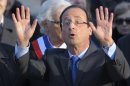 Francois Hollande, Socialist Party candidate for the 2012 French presidential election, waves after his speech at a ceremony in Paris to mark the mass killing of Armenians by Ottoman Turks 97 years ago Tuesday, April 24, 2012. (AP Photo/Philippe Wojazer/Pool)