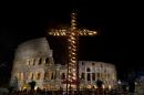 A view of the Colosseum prior to the arrival of Pope Francis to lead the Via Crucis (Way of the Cross) torchlight procession celebrated at the Colosseum on Good Friday in Rome, Friday, March 25, 2016. The evening Via Crucis procession at the ancient amphitheater is a Rome tradition that draws a large crowd of faithful, including many of the pilgrims who flock to the Italian capital for Holy Week ceremonies before Easter Sunday. (AP Photo/Andrew Medichini)