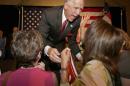 Thom Tillis greets supporters at a election night rally in Charlotte, N.C., after winning the Republican nomination for the U.S. Senate Tuesday, May 6, 2014. Tillis, the Republican establishment's favored son in North Carolina, won the state's Senate nomination by running as a proud conservative who's not terribly different from his tea party and Christian-right opponents. (AP Photo/Chuck Burton)