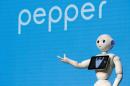 A SoftBank's robot 'pepper', performs during a news conference in Taipei