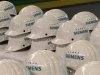 Saftey helmets are piled up at Siemens AG gas turbine factory hall in Berlin