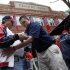 Fans pass through security before entering Fenway Park for a baseball game between the Boston Red Sox and the Kansas City Royals in Boston, Saturday, April 20, 2013. (AP Photo/Michael Dwyer)