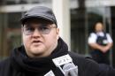 Megaupload founder Dotcom talks to members of the media outside the New Zealand Court of Appeals in Wellington