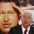 Venezuela's Energy Minister Rafael Ramirez talks to the media in front of a giant picture of Venezuela's President Hugo Chavez during a news conference at the headquarters of the state-run oil company PDVSA in Caracas