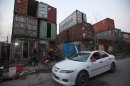 Photos: Shanghai's poor find 'home' in shipping containers