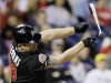 Miami Marlins' Austin Kearns loses his bat swinging at a strike in the eighth inning of a baseball game against the Philadelphia Phillies, Monday, Sept. 10, 2012, in Philadelphia. Philadelphia won 3-1. (AP Photo/Matt Slocum)