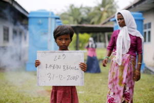 A Rohingya migrant mother (R), who recently arrived &hellip;