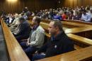 Members of the right-wing "Boeremag" wait ahead of their sentencing at Pretoria High Court