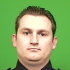 This image provided by the New York City Police Department shows officer Lukasz Kozicki, 32, who was struck three times Thursday Jan. 3, 2013; once in each of his upper thighs and once in the groin when he and officer Michael Levay confronted a man on a Manhattan-bound N train. Officer Michael Levay was shot in the lower back, but his vest stopped the bullet. He returned fire, killing the suspect. (AP Photo/New York City Police Department)