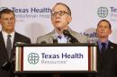 Texas Health Presbyterian Hospital Chief Clinical Officer Dr. Daniel Varga answers questions about a health care worker who provided hospital care for Thomas Eric Duncan who contracted Ebola, during a press conference at the hospital, Sunday, Oct. 12, 2014, in Dallas. Varga says the worker was in full protective gear when they provided care to Duncan during his second visit to Texas Health Presbyterian Hospital. (AP Photo/Brandon Wade)