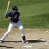 Milwaukee Brewers' Ryan Braun hits during a spring training baseball game against the San Francisco Giants, Sunday, March 4, 2012, in Phoenix. (AP Photo/Morry Gash)