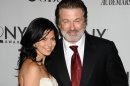 FILE - In this June 12, 2011 file photo, Alec Baldwin, right, and Hilaria Thomas arrive at the 65th annual Tony Awards in New York. Baldwin proposed to Thomas over the weekend. They began dating last year. Baldwin was married once before to actress Kim Basinger.(AP Photo/Charles Sykes, file)