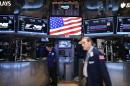 Traders work on the floor of the New York Stock Exchange on May 21, 2014