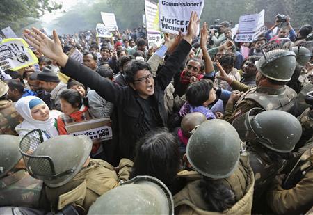 Demonstrators shout slogans as they are surrounded by the police during a protest rally in New Delhi in this December 27, 2012 file photo. It's no surprise the Indian street wants faster, harsher justice for sexual crimes after a horrific gang rape that rocked the nation, but some activists worry the government will trample fundamental rights in its rush to be in tune with popular rage. Last month's rape of a physiotherapy student on a moving bus and her death on December 28, 2012 in hospital triggered a national debate about how to better protect women in India, where official data shows one rape is reported on average every 20 minutes. REUTERS/Adnan Abidi/Files