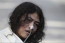 India's Irom Sharmila, who has been on a hunger strike for 12 years to protest an Indian law that suspends many human rights protections in areas of conflict, speaks during a press conference, in New Delhi, India, Monday, March 4, 2013. Sharmila who has been force fed through a tube by authorities was charged Monday with attempted suicide in a case likely to bring major attention to her quiet protest in the tiny northeastern state of Manipur against the Armed Forces Special Powers Act. (AP Photo/Tsering Topgyal)