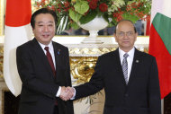 Japan's Prime Minister Yoshihiko Noda, left, greets Myanmar's President Thein Sein before their summit talks held on the sidelines of the Mekong-Japan Summit at the State Guest House in Tokyo on Saturday, April 21, 2012. (AP Photo/Tomohiro Ohsumi, Pool)