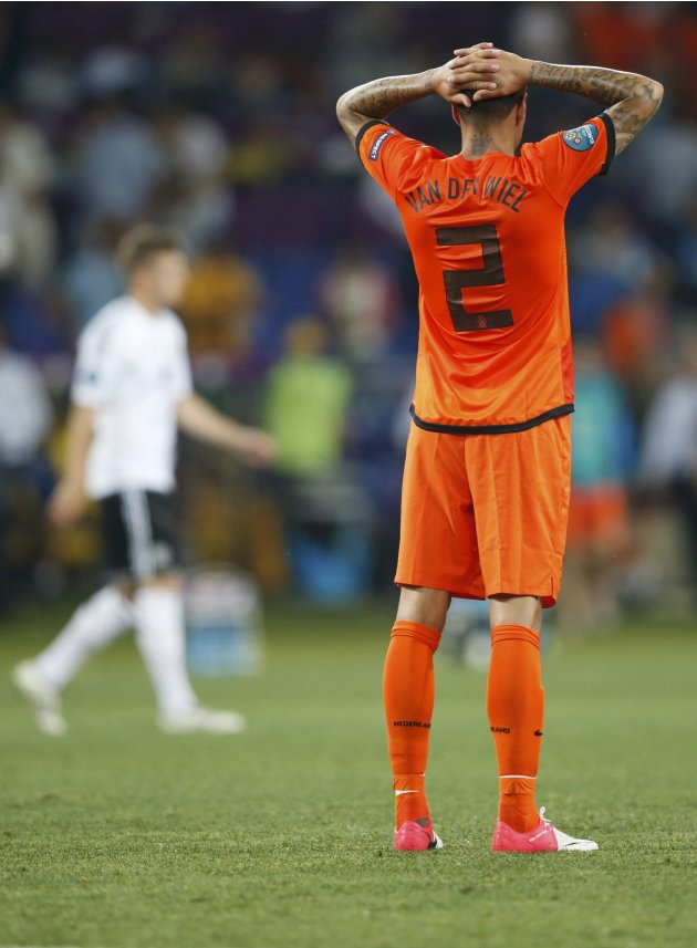 Netherlands' Van der Wiel reacts at the end of their Group B Euro 2012 soccer match against Germany in Kharkiv