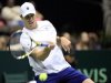 Querrey of the U.S. hits a return to Brazil's Alves during their Davis Cup world group first round tennis match in Jacksonville, Florida