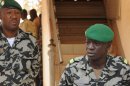 Malian junta leader Amadou Sanogo (R) speaks in Kati