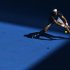 Juan Martin del Potro of Argentina hits a return to Jeremy Chardy of France during their men's singles match at the Australian Open tennis tournament in Melbourne