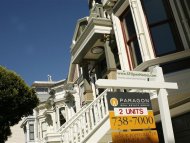 A pair of housing units are shown for sale in San Francisco