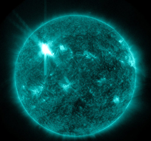 This extreme ultraviolet wavelength image provided by NASA shows a solar flare. An impressive solar flare is heading toward Earth and could disrupt power grids, GPS and airplane flights. An impressive solar flare is heading toward Earth and could disrupt power grids, GPS and airplane flights. Forecasters at the National Oceanic and Atmospheric Administration's (NOAA) Space Weather Prediction Center said the sun erupted Tuesday evening and the effects should start smacking Earth late Wednesday night, close to midnight EST. They say it is the biggest in five years and growing. (AP Photo/NASA)