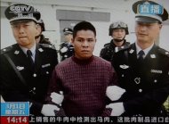 Condenado Zha Xika é retirado de sua cela de prisão na província de Yunnan
