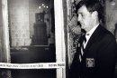 FILE - In this March 21, 1990 file photo, a security guard stands outside the Dutch Room of the Isabella Stewart Gardner Museum in Boston, where robbers stole more than a dozen works of art by Rembrandt, Vermeer, Degas, Manet and others, in an early morning robbery. Assistant U.S. Attorney John Durham said Tuesday, March 27, 2012, in federal court in Hartford, Conn., that the FBI believes Connecticut inmate Robert Gentile â€œhad some involvement in connection with stolen propertyâ€ related to the art heist. Agents have had unproductive discussions about the theft with Gentile, a 75-year-old reputed mobster who is jailed in a drug case. (AP Photo, File)